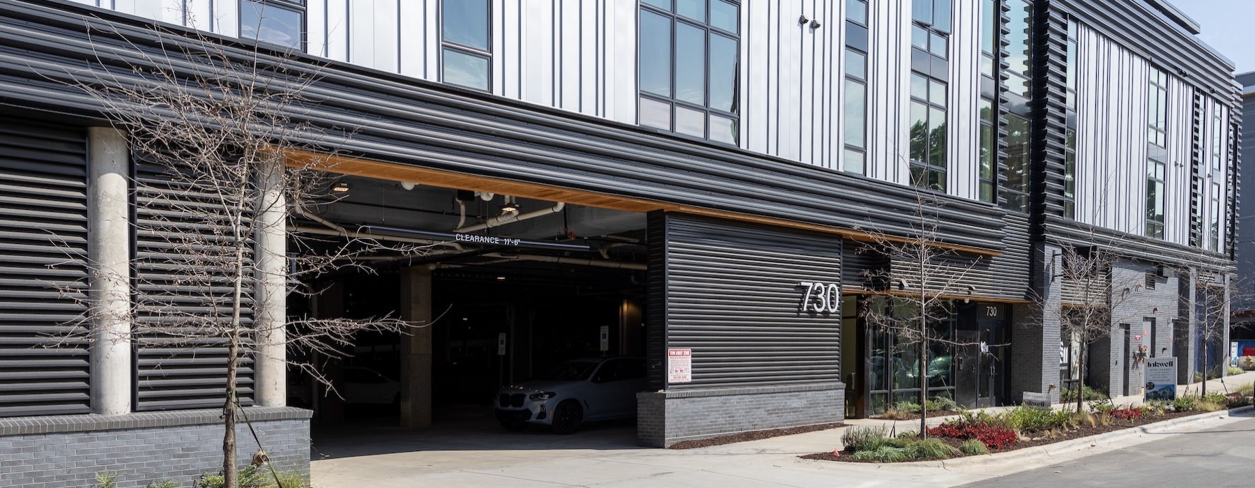 a building with a parking garage entrance