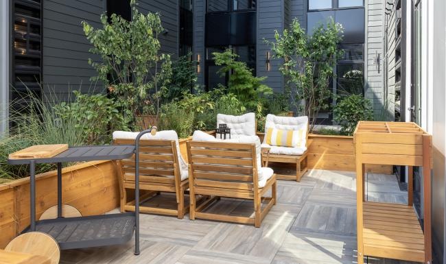 a deck with chairs and tables